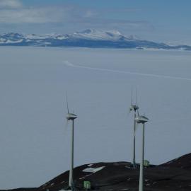 The wind farm turbines and Black Island