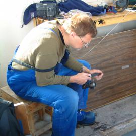 Joe Frey in fish hut off Cape Armitage fishing for P. borchgrevinki