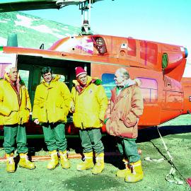 Four members of DC-10 Commission about to board helicopter