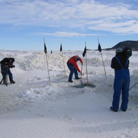 Miles Lamare being filmed by TVNZ and TV3 film crew, clearing the safety dive hole at the Cape Armitage dive site