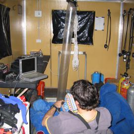 Miles Lamare down-loading underwater spectroradiometer at the Cape Armitage dive hut