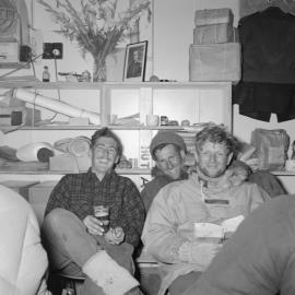 Geoffrey Lee Martin, Jim Bates, and Bernard Gunn inside the Mess hut