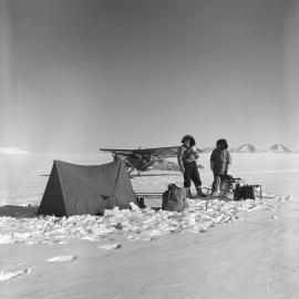 Bernie Gunn and Richard Brooke at depot on the Wilson Piedmont Glacier, above Cape Roberts, collecting stores brought in by RNZAF Auster