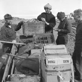 Members of Restoration Party with historic articles found in Scott's Hut: Grant Hurrell, Eric Gibbs, Baden Norris, Rodney Smith