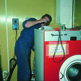 Steve Pardoe (electrician) repairing a drier