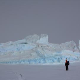 Inspecting an iceberg off Cape Roberts.