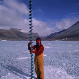Clive Howard-Williams shows the ice cap depth of Lake Vanda