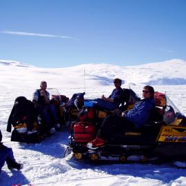Megan having morning tea after packing up our campsite on our trip to the Imax Crevasse