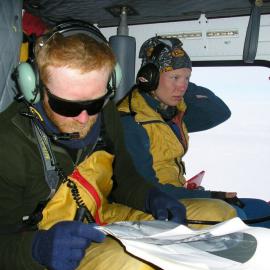 Hanne Paulsen and Adam Martin in a vehicle