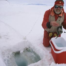Staff visit (Tim Higham orientation): John McDonald (K012) fishing, Cape Armitage