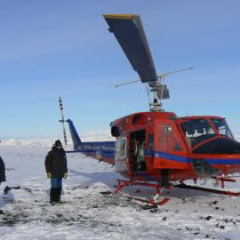 Tim Hay and Graham McElroy with US helicopter at Cape Bird