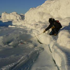Tim Hay collecting frost flowers at Cape Bird