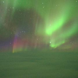 Aurora Australis taken from the cockpit of a C17 in flight over Antarctica