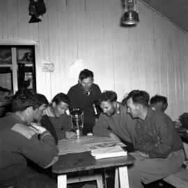 Expedition members discussing training in Malte Brun hut