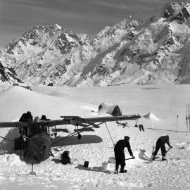 Erecting protective snow wall around damaged Auster