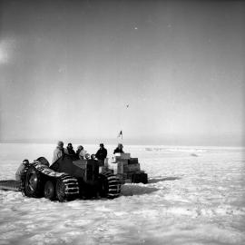 Members of the tractor party have a rest