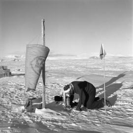 John Claydon reading gravity meter at Skelton Glacier