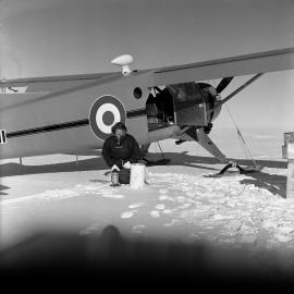 John Claydon taking a reading on gravity meter on the Polar Plateau