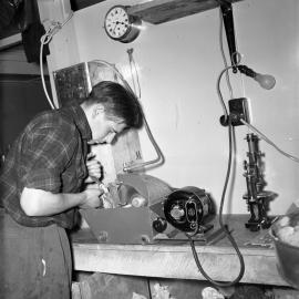 Guyon Warren cutting rock specimens