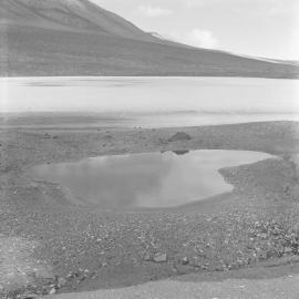 Shallow melt pool at side of large lake footing 