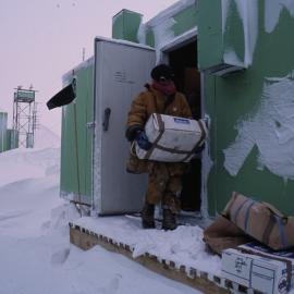 Tuppence Loe Collecting Food from Store