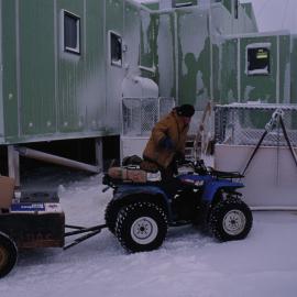 Taking Food to Kitchen by Quad Bike and Trailer