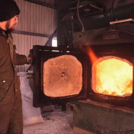 Bob Geddes Checking the Incinerator