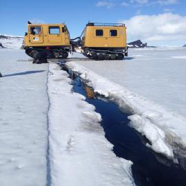 Crossing an open sea ice crack between Cape Evans and Cape Royds