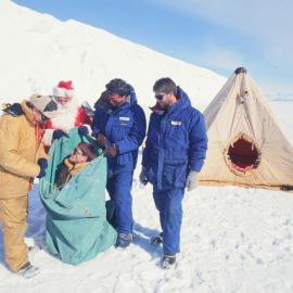 Father Christmas Vivirts a field Camp