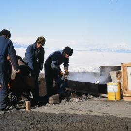 Pouring Concrete in from of Hangar