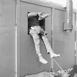 Climbing out the window 