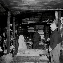 Baden Norris and Eric Gibbs Shovel Snow from Scott's Hut