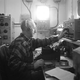 Radio Operator Ted Gawn at Work