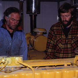 Bob Dunnachie and Doug Mitchell Working on Generator