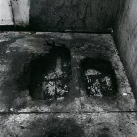 Holes in floor under kitchen stove 