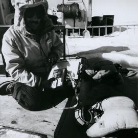 Dr S Legg monitoring R Janek in Quick Don Immersion suit