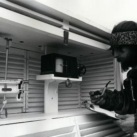 Tony Bromley takes reading from thermograph in met screen