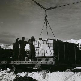 A Pallet load of boxed goods goes aboard a sledge at Kainan Bay| Antarctica
