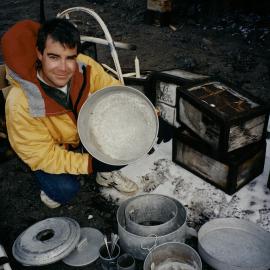 Lawrence Smith with artefacts from Inexpressible Island