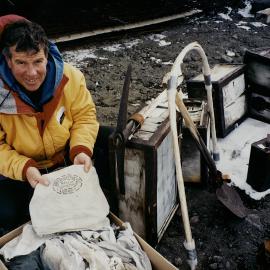 John Charles with artefacts from Inexpressible Island