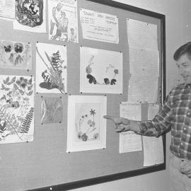 Peter Cresswell admiring gifts from school pupils