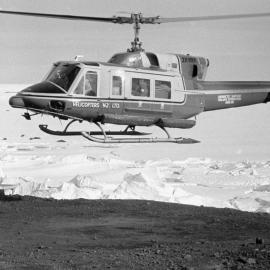 Helicopter by the flag pole