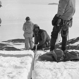 Survival training| Castle Rock| stretcher being lowered| reached the end of the rope