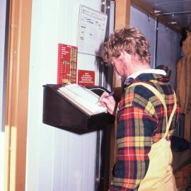 Don Wilkinson at the 'Sign Out' Book