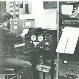Meteorologist at surface synoptic recording equipment, South Pole Station