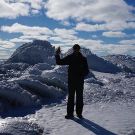 Waving to the penguins at Cape Bird