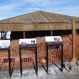 The onsite interpretation panels installed by AHT at Discovery Hut for the duration of the conservation project