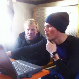 Examining seismic data in evening 