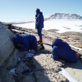 Cold Work on an Outcrop on Mt Hercules. West Side of Mt Jason in Distance
