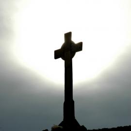 Muted Sun behind Vince's Cross